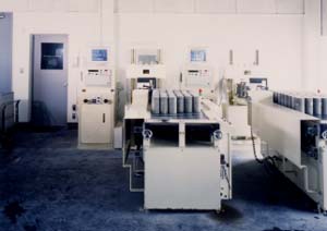 Automatic compression test system for concrete cylinder specimens 